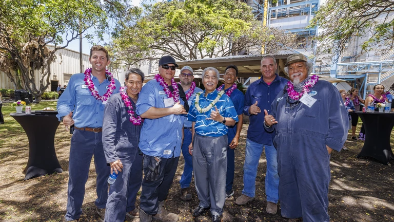 men wearing leis