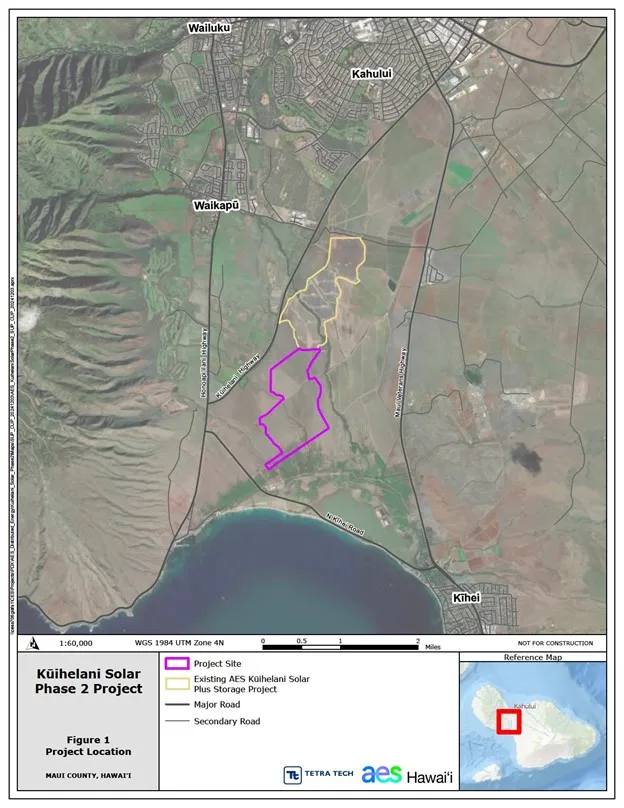 Map showing the location of the Kūihelani Solar Phase 2 Project in Maui County, Hawaii. The project site is outlined in purple, adjacent to the existing AES Kūihelani Solar Plus Storage Project outlined in yellow. Nearby towns such as Wailuku, Kahului, Waikapū, and Kīhei are labeled, along with major and secondary roads. A small inset map of Hawaii in the bottom right corner highlights the project’s location on Maui island. The map is titled 'Figure 1 Project Location'